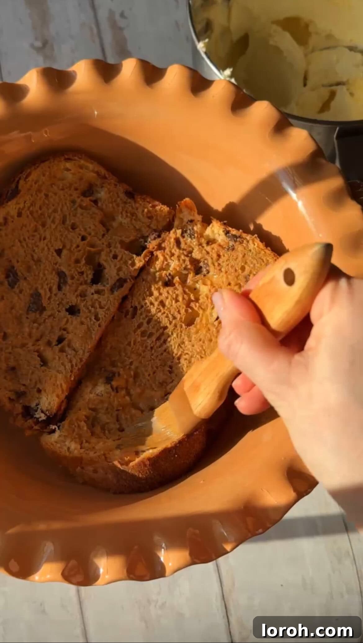 Brushing panettone slices with the cooled coffee and Baileys mixture.