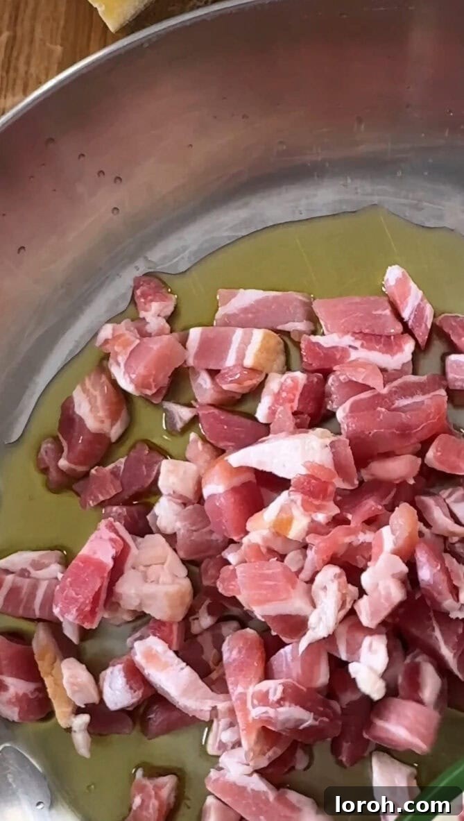 Step one: Cooking lardons in a pan with olive oil.