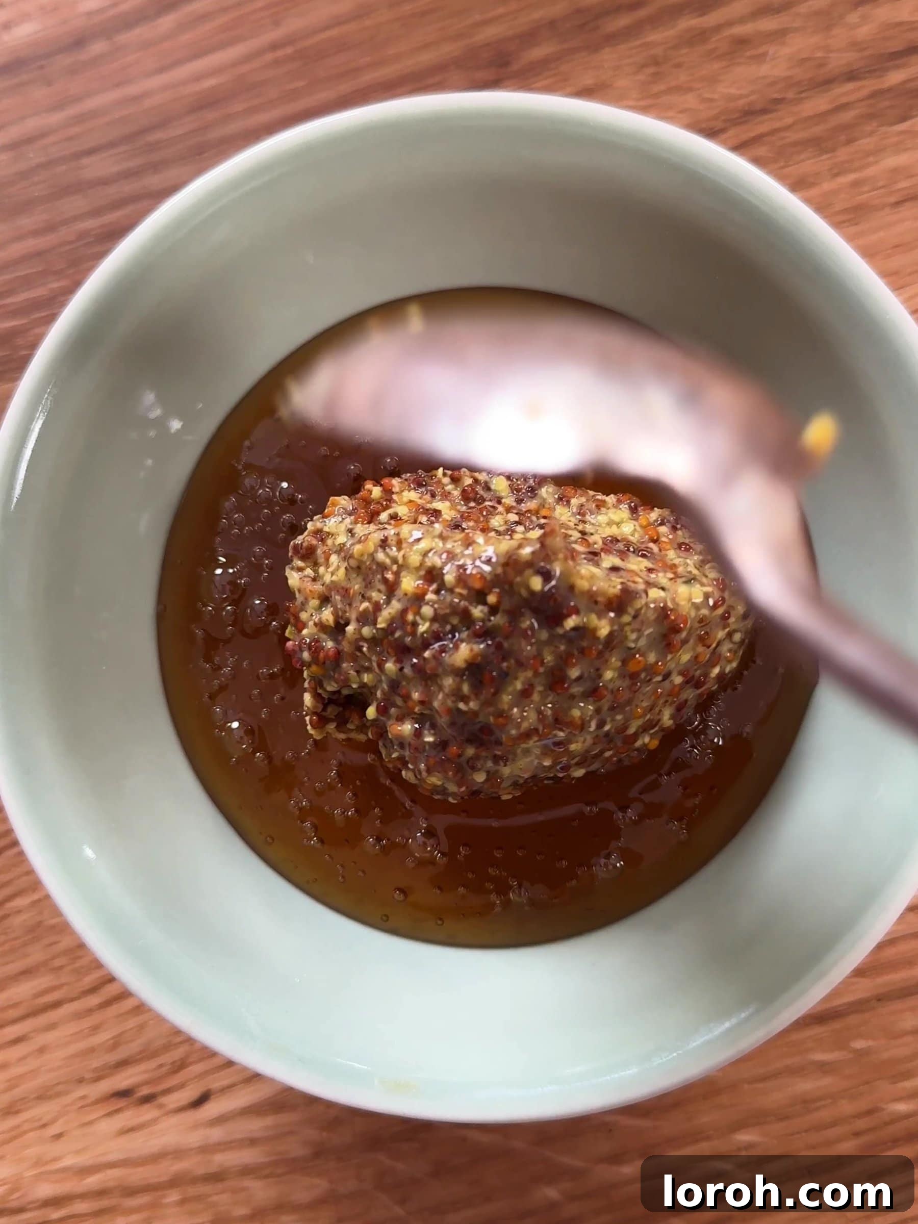 Mixing honey and mustard in a bowl