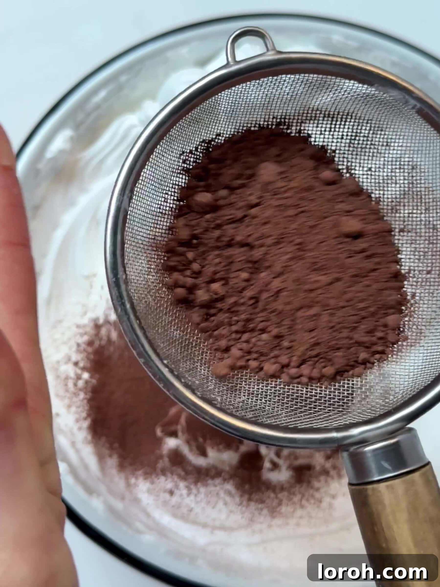 Holiday Spiced Pear Cloud 12 Adding cocoa powder to whipped egg whites.