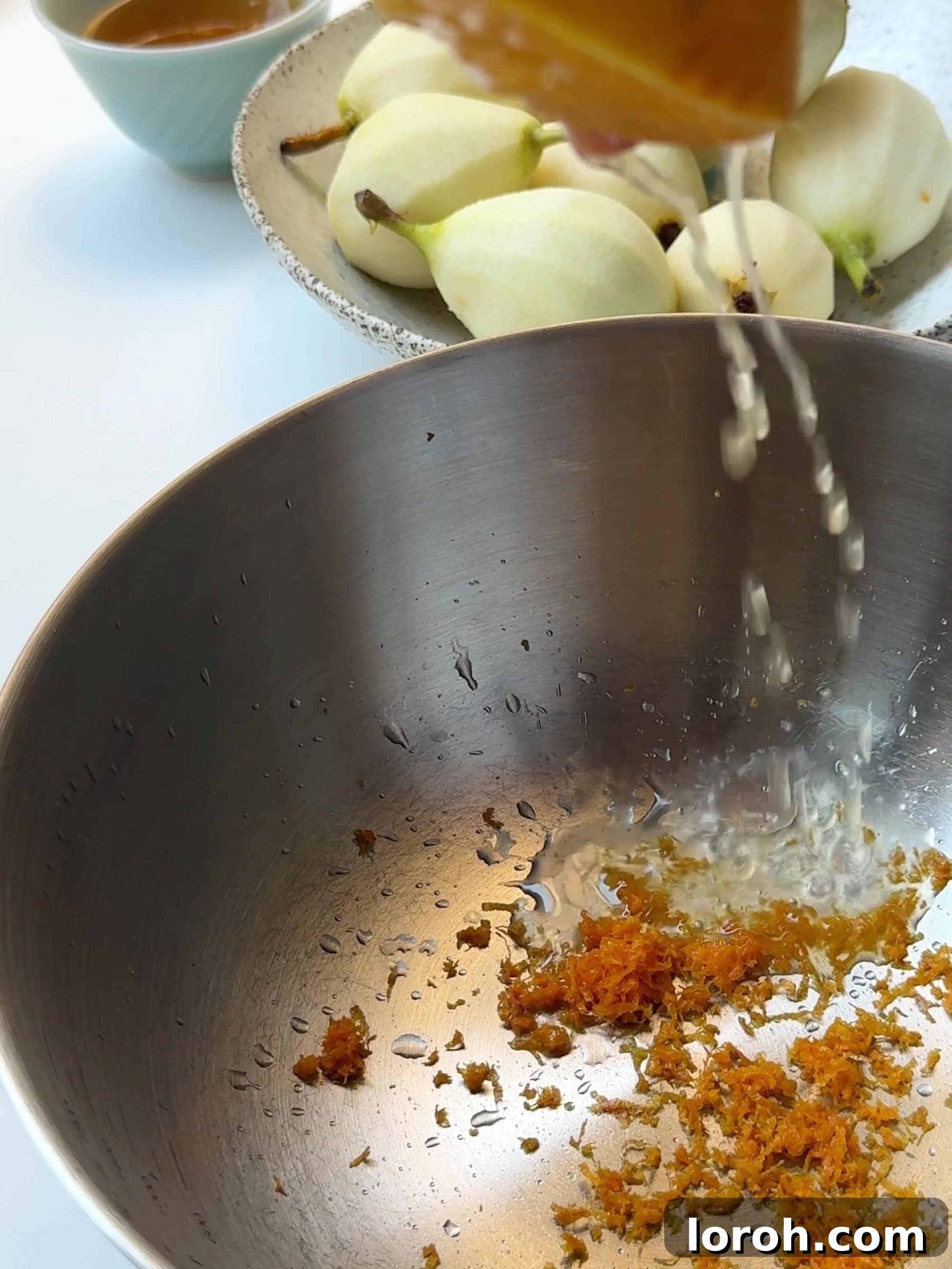 Holiday Spiced Pear Cloud 4 Lemon zest and juice in a pot.