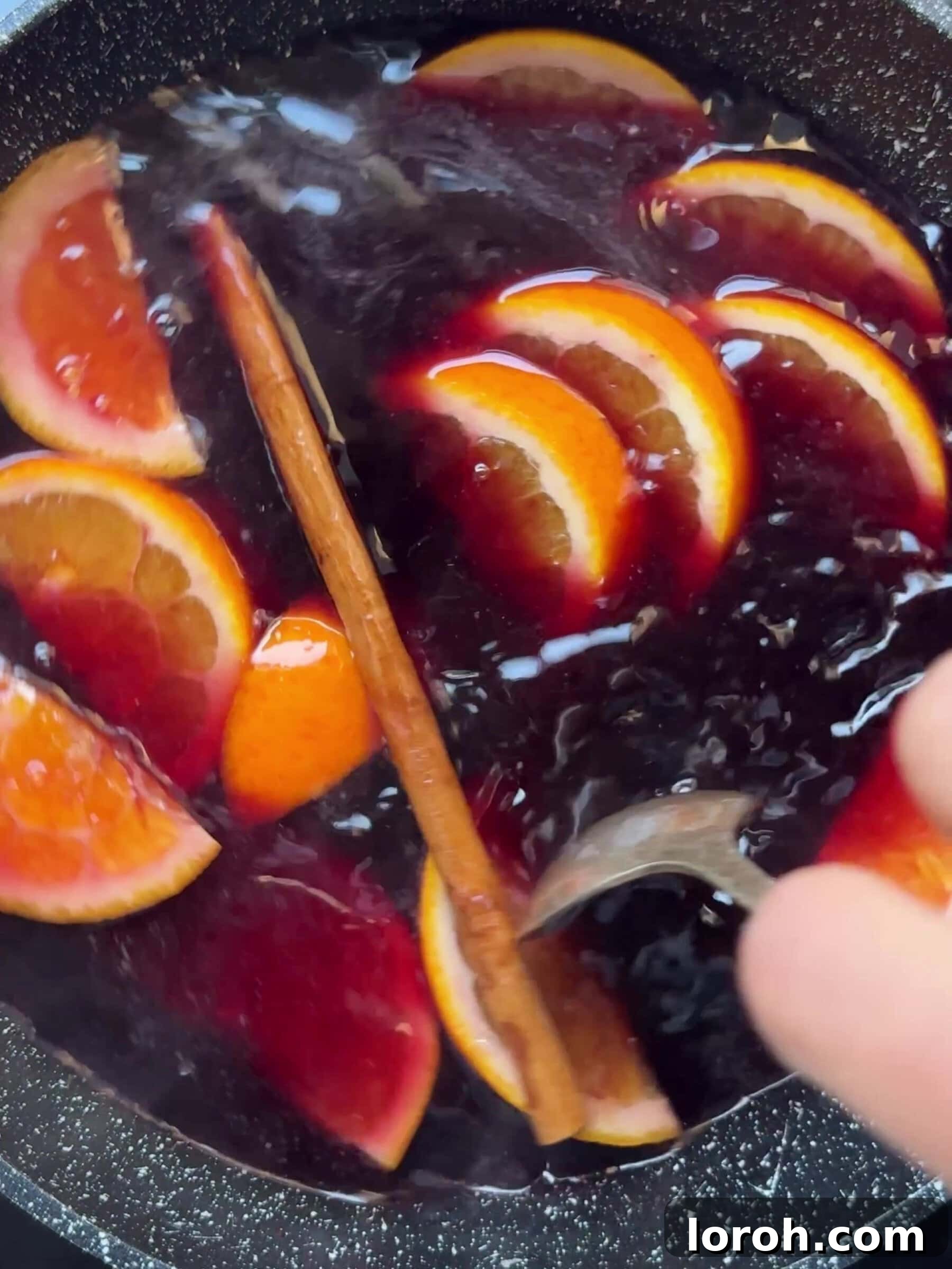 Holiday Spiced Pear Cloud 7 Slices of oranges and a cinnamon stick.