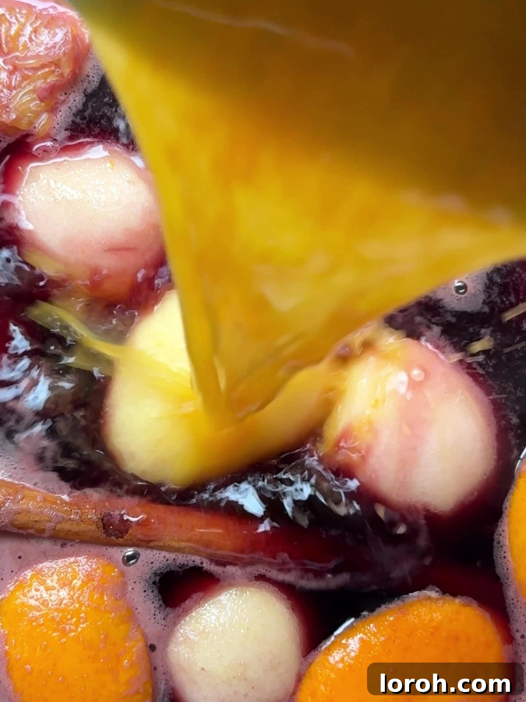 Holiday Spiced Pear Cloud 8 Adding orange juice to red wine to poach pears.
