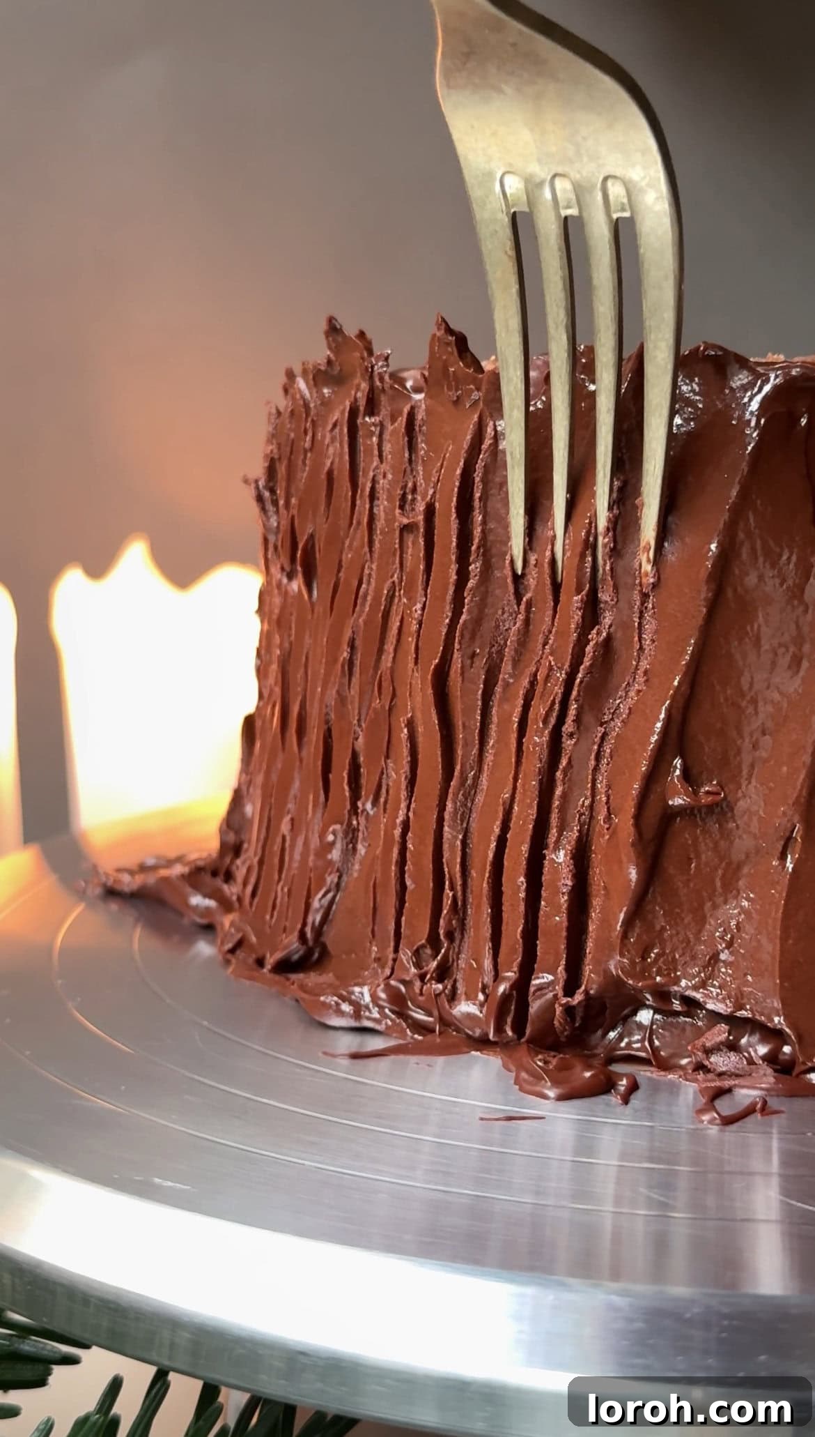 Winter Woodland Roll 19 using a fork to make the lines of bark on the yule log.