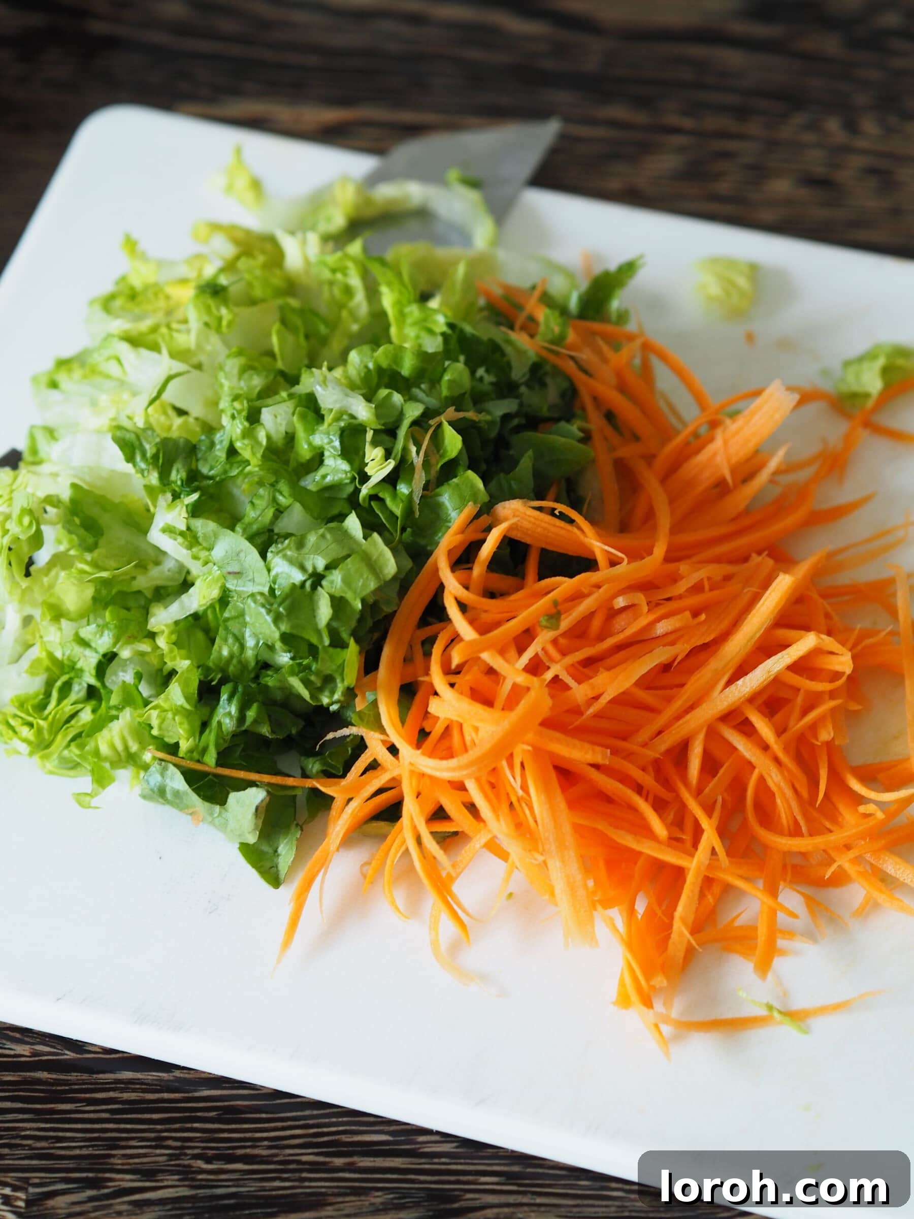 Fresh vegetables being sliced for the crunchy salad.