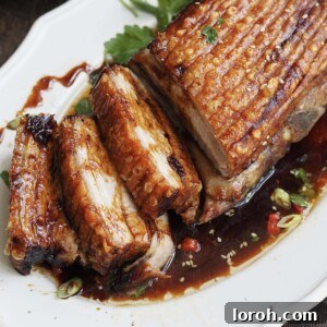 Air fryer pork belly sliced and served.