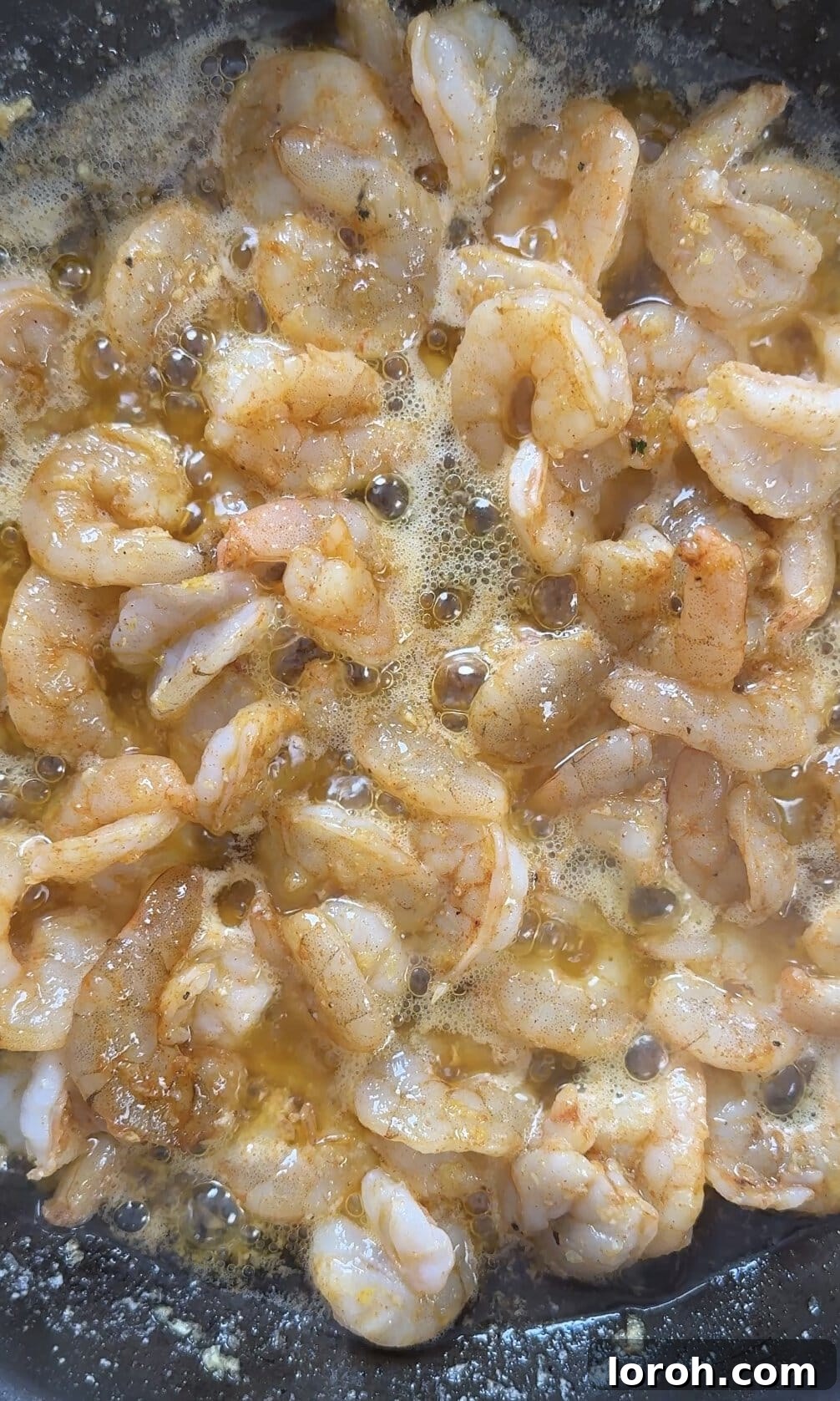Sizzling Garlic Butter Prawns 9 frying buttered garlic prawns.