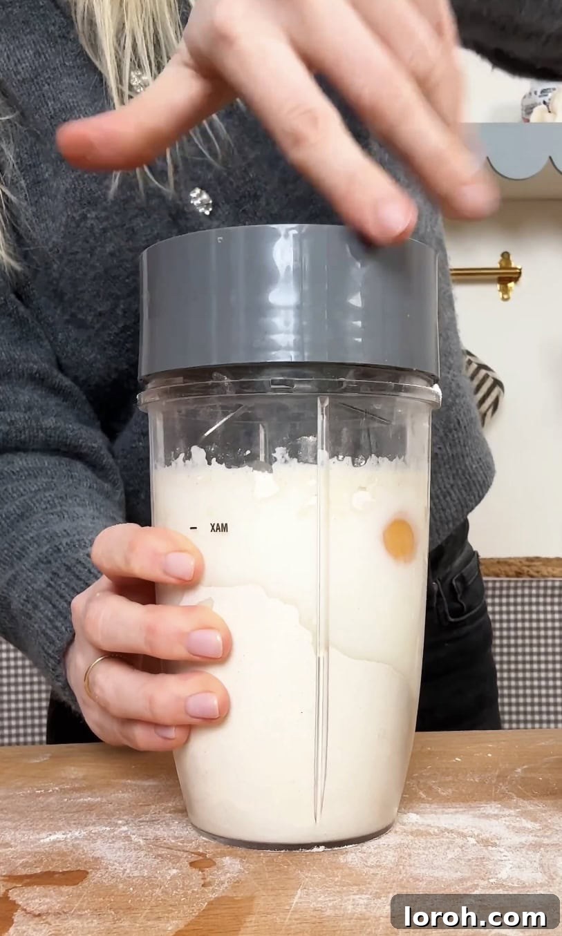 Golden Banana Crêpes 5 Adding all crepe ingredients into a blender for quick and effortless mixing.