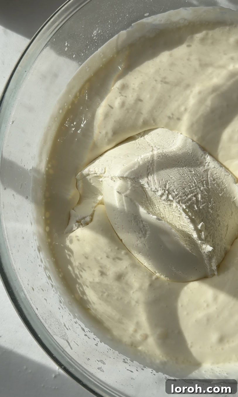 Pannukakku: Finland's Golden Oven-Baked Delight 6 adding mascarpone to double cream.