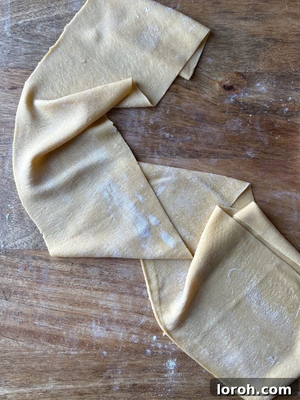 Rolled out pasta dough sheets.