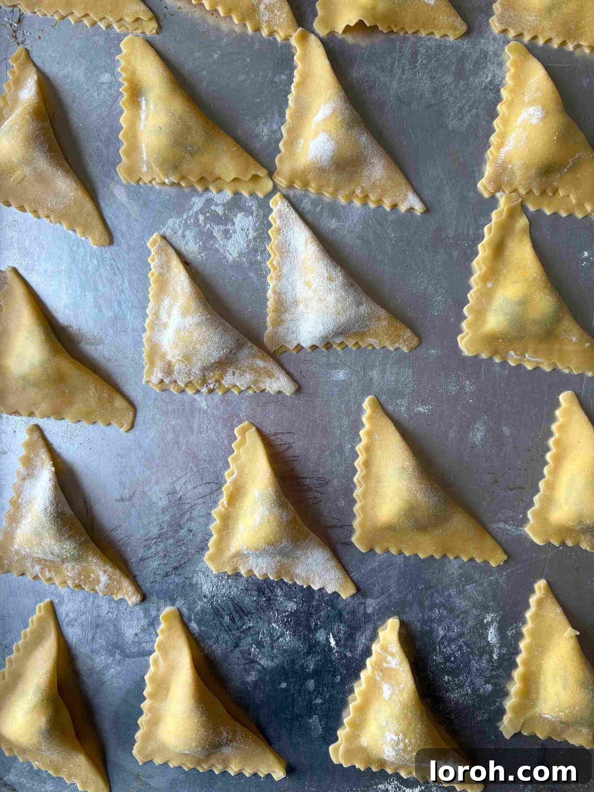 Crafting Delicious Triangoli Pasta From Scratch 10 Folding and sealing triangoli pasta.