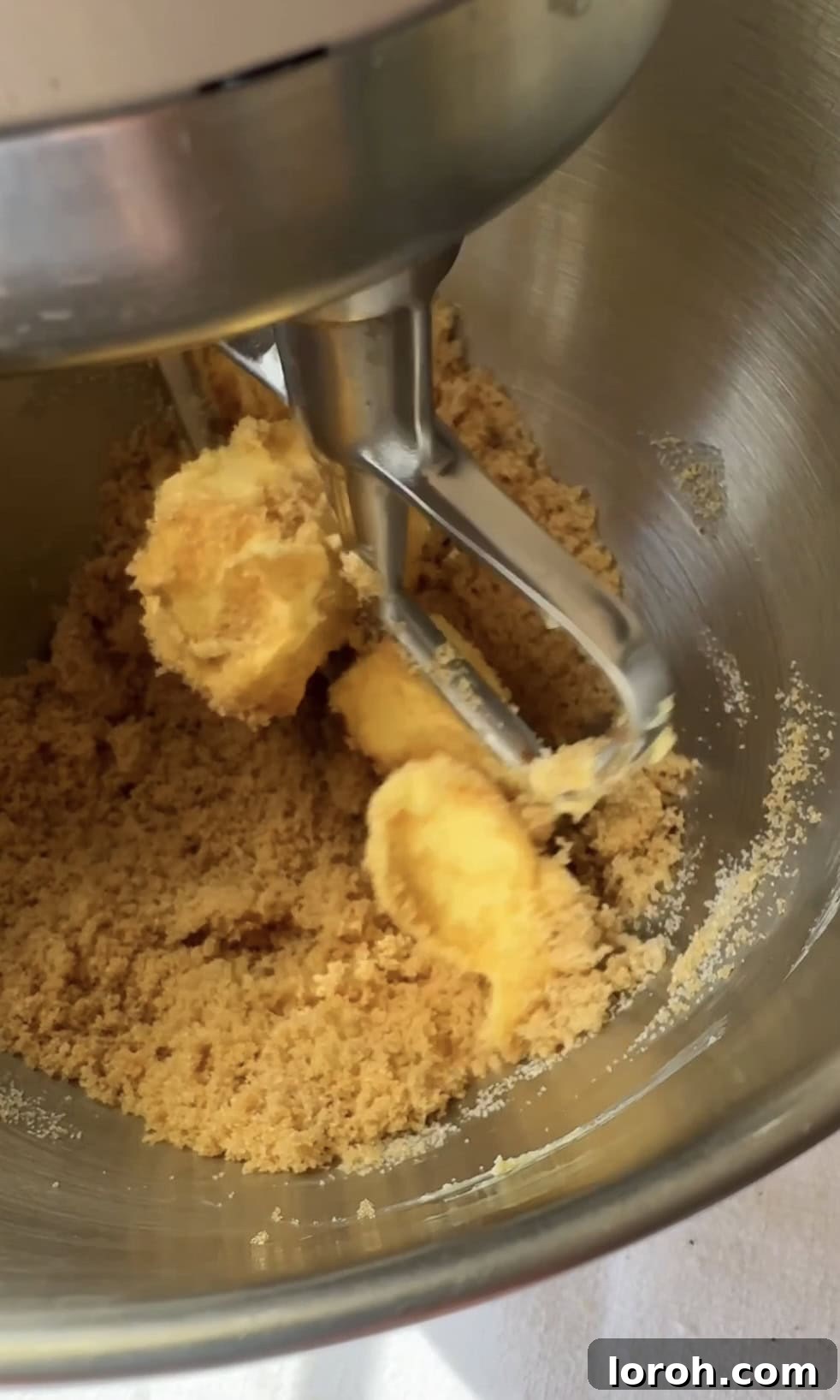 Speckled Egg Delights 4 beating softened butter and sugars together in a mixing bowl for mini egg cookies.