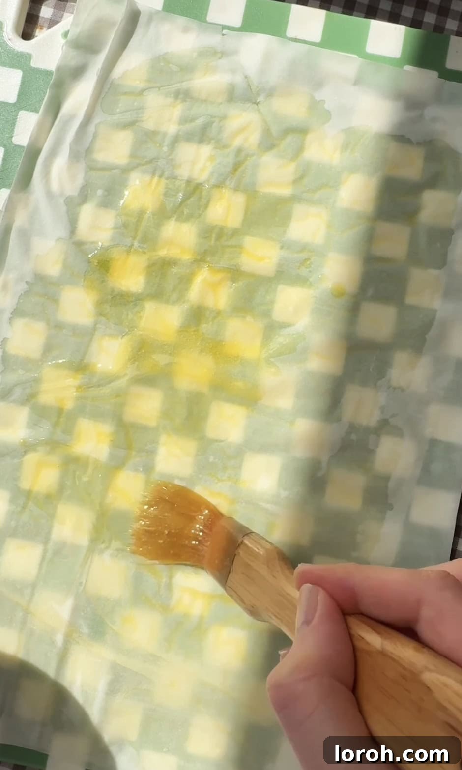 Flaming Feta Saganaki 6 Brushing the second layer of filo pastry with more melted butter