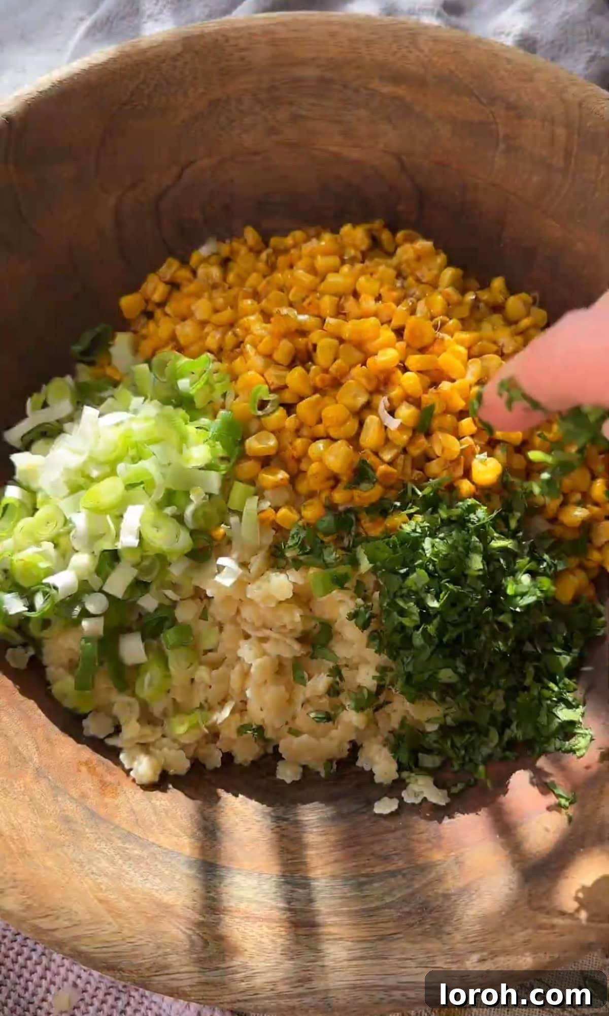 Vibrant Pastina Salad with Smoky Corn and Tangy Feta 7 combining all ingredients for the pastina salad in a large bowl.