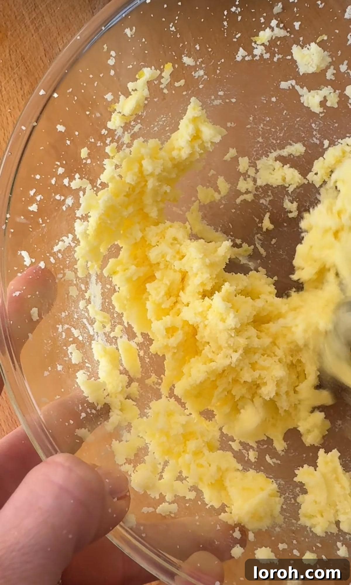 Zesty Lemon Poppy Seed Delights 5 Creaming softened butter and the lemon-infused sugar together in a mixing bowl until light and fluffy.