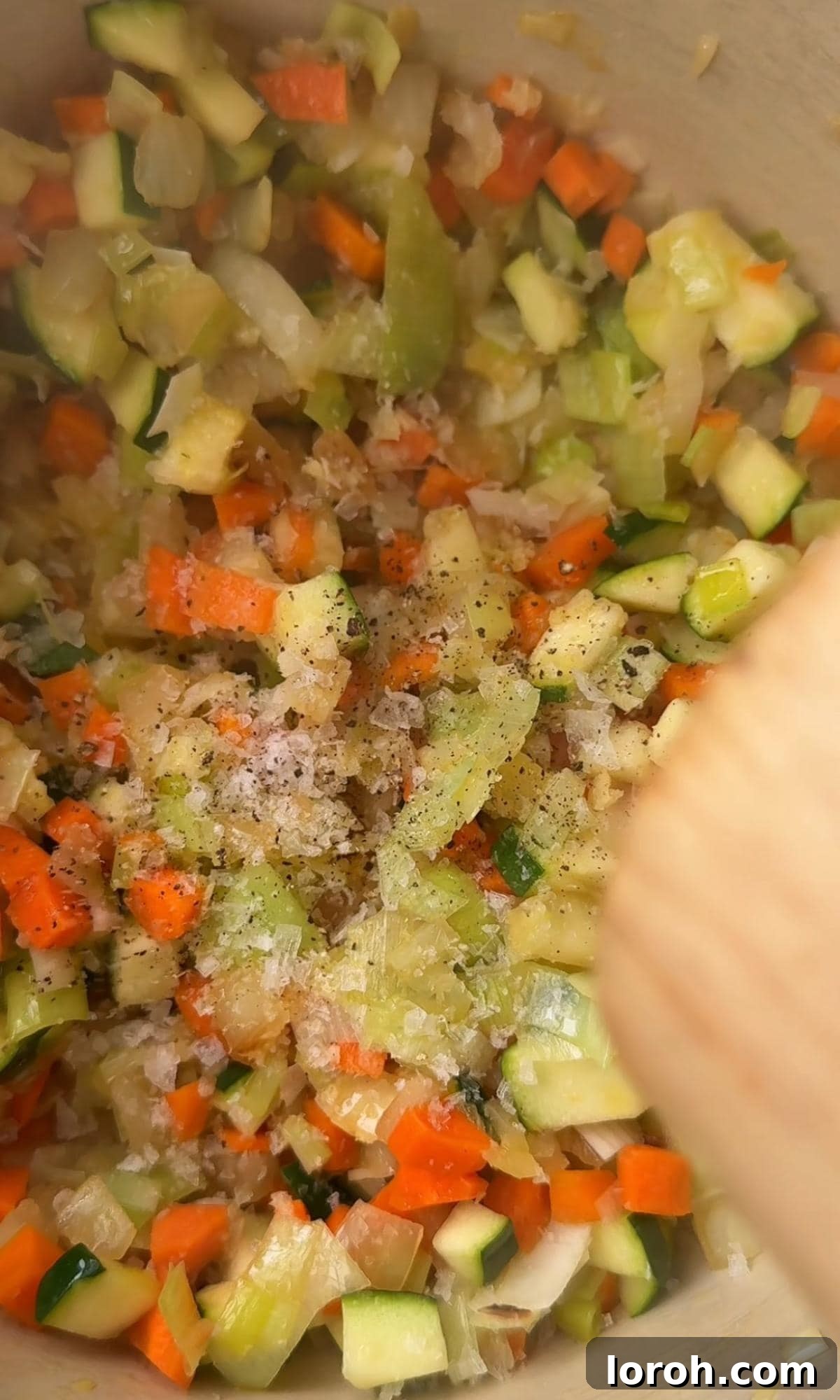 Rustic Tomato and Bean Stew with Cavolo Nero 4 Sautéing diced onions, courgette, carrots, and leek in a large saucepan with olive oil, seasoned lightly.