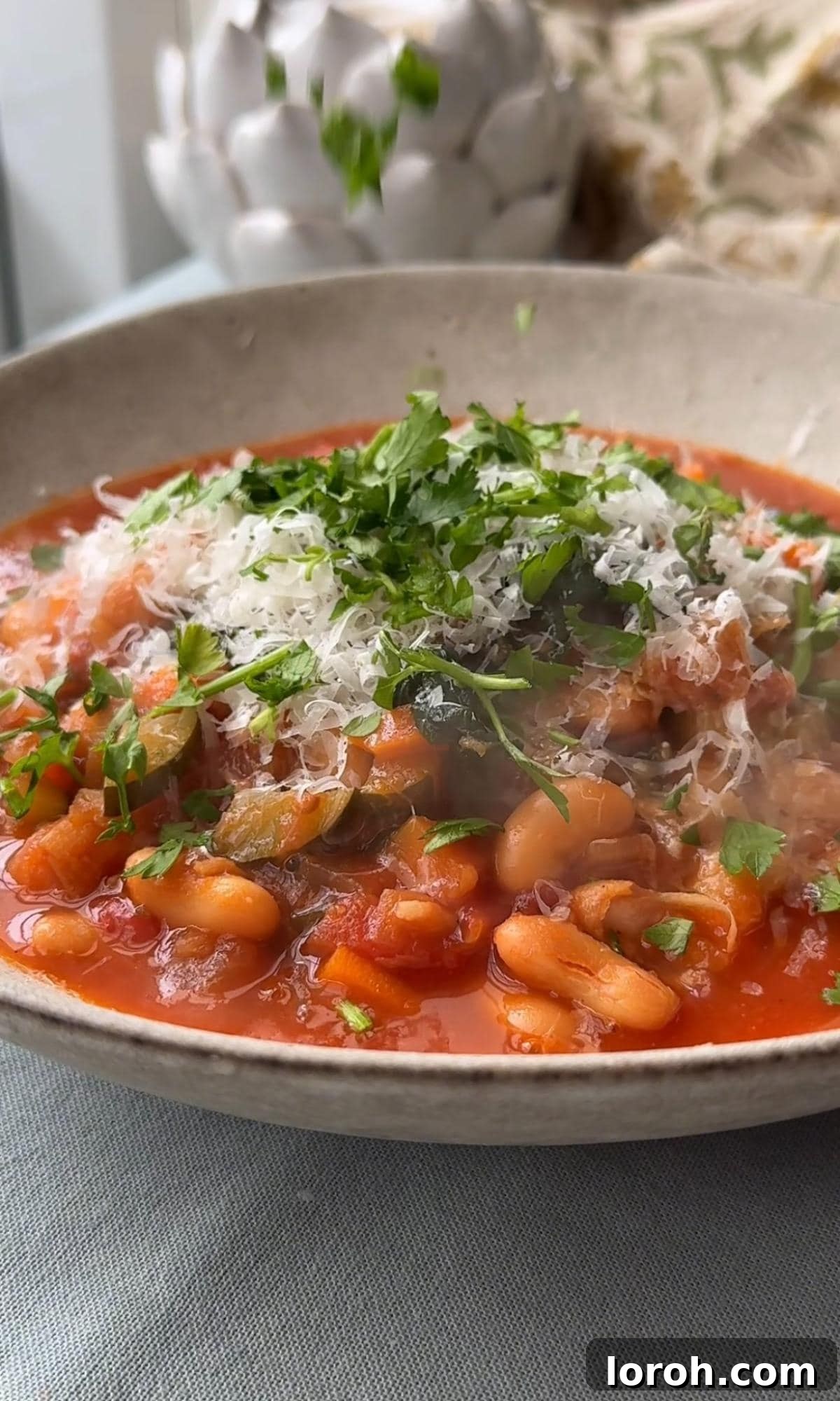 Rustic Tomato and Bean Stew with Cavolo Nero 8 Stirring chopped cavolo nero into the bean stew during the final minutes of cooking.