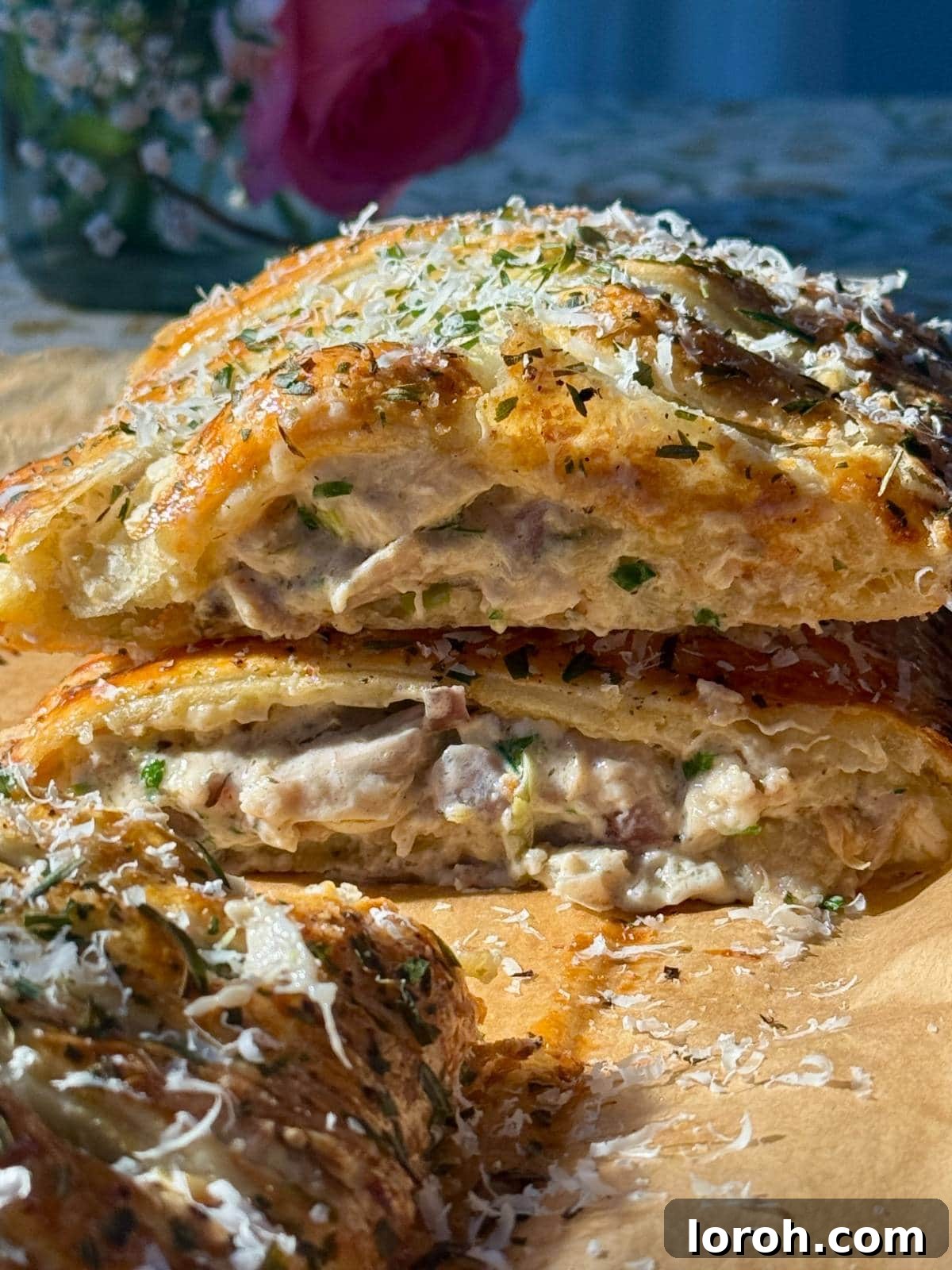 Velvety Chicken, Mushroom, and Leek Pie 3 A chicken pie with mushrooms expertly shaped into a decorative plait, showcasing the golden pastry.