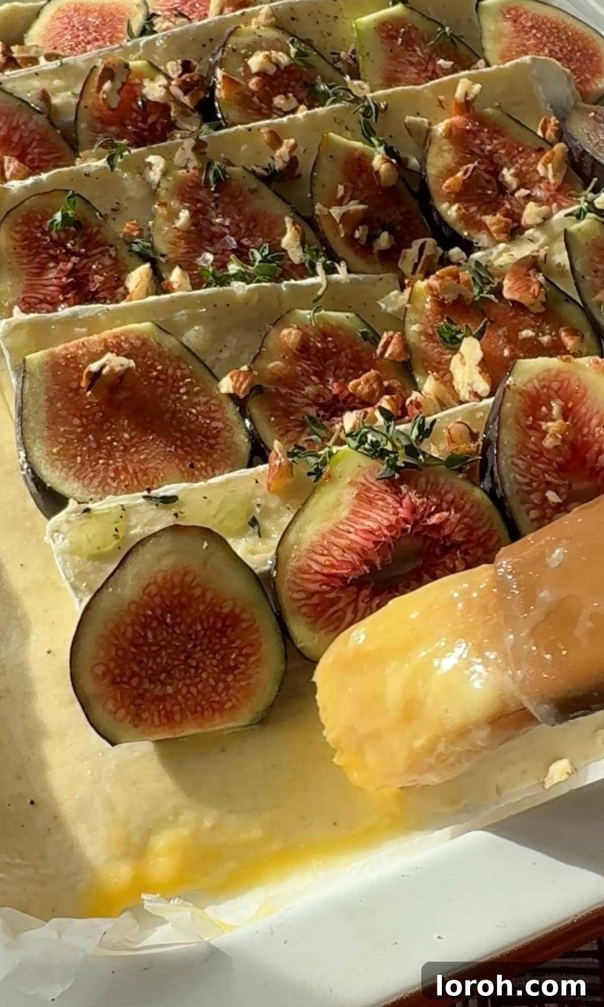 Fig and Brie Bliss Tart 7 Brushing egg wash onto the edges of the tarte aux figues for a golden finish.