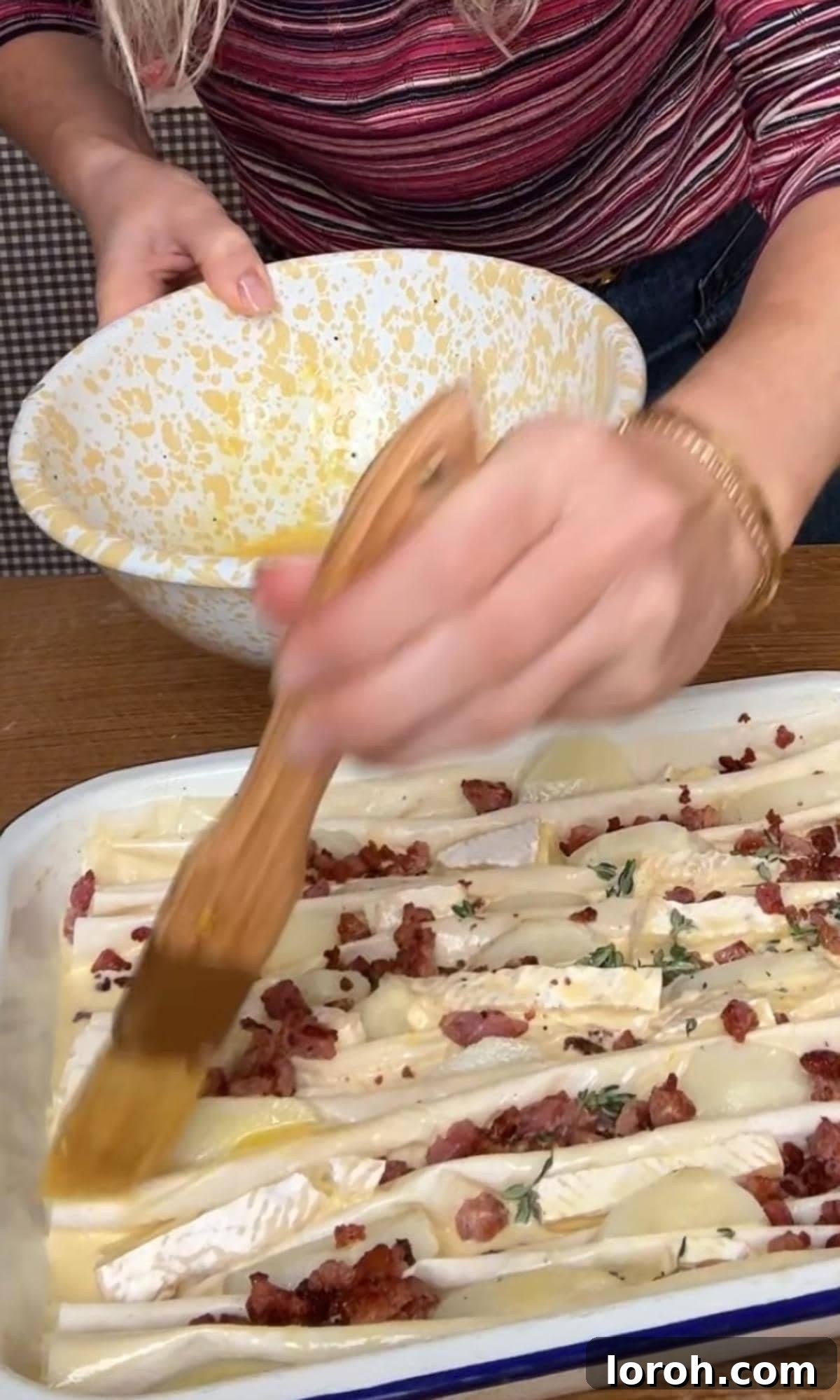 Golden Filo-Wrapped Potato Tart with Melted Brie and Crispy Pancetta 8 Step five: Brushing the top of the potato tart with an egg wash before baking.