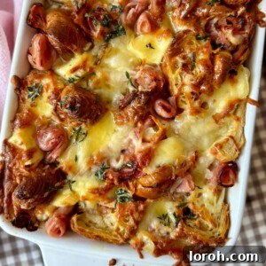 A golden-brown ham and cheese croissant bake, beautifully cropped for a tempting thumbnail.