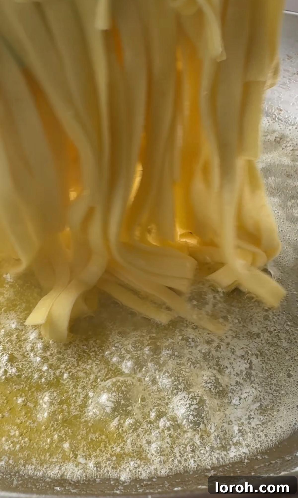Silky Truffle Pasta Delight 3 adding pasta to melted butter.
