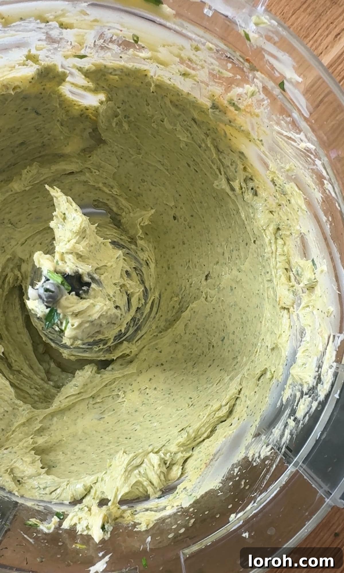 Effortless Homemade Cafe de Paris Butter 6 The perfectly blended and vibrant Cafe de Paris butter in the food processor.