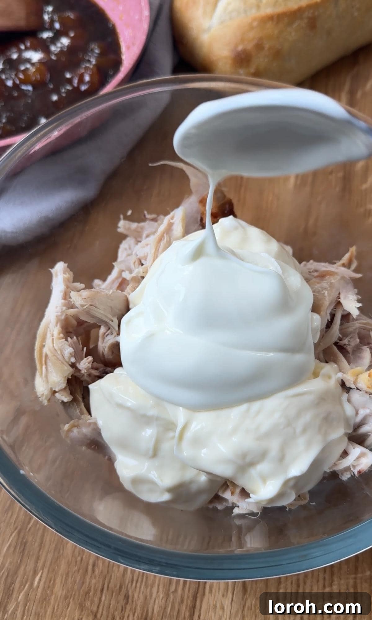 The Ultimate Coronation Chicken Sandwiches 5 Combining mayonnaise and Greek yogurt with shredded chicken for a creamy base.