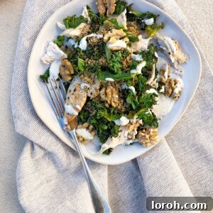 Gourmet Chicken Caesar Salad with Quinoa, Kale, and Crunchy Walnuts