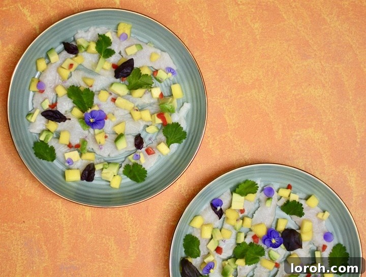 A beautifully presented ceviche dish, vibrant with fresh ingredients, inspired by Martha Ortiz's culinary style.