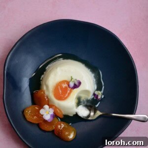 Giovanna Ryan's Creamy Greek Yogurt Pannacotta with Honey-Glazed Apricots 2 Creamy Greek Yogurt Panna Cotta topped with golden sticky apricots and a sprig of mint.