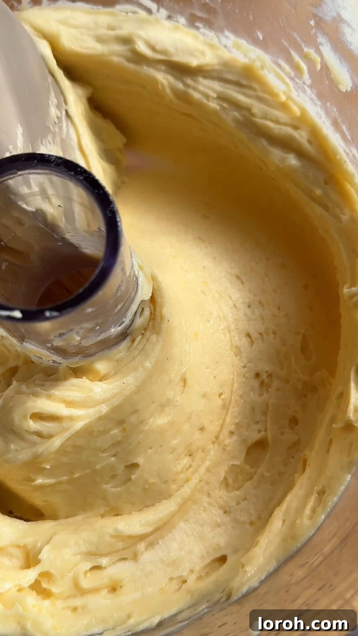 Sunshine Lemon Loaf 8 Close-up of the smooth, pale yellow cake batter in the food processor bowl after blending.