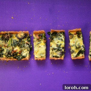 Delicious Red Onion, Pancetta, Blue Cheese & Cavolo Nero Tart, golden brown and ready to serve
