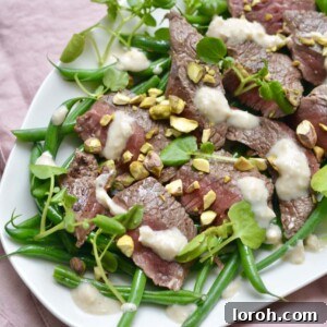 Steak with garlicky green beans and pistachios