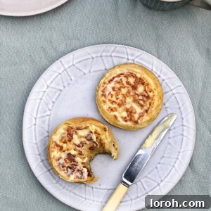Perfectly cooked golden crumpets stacked on a plate