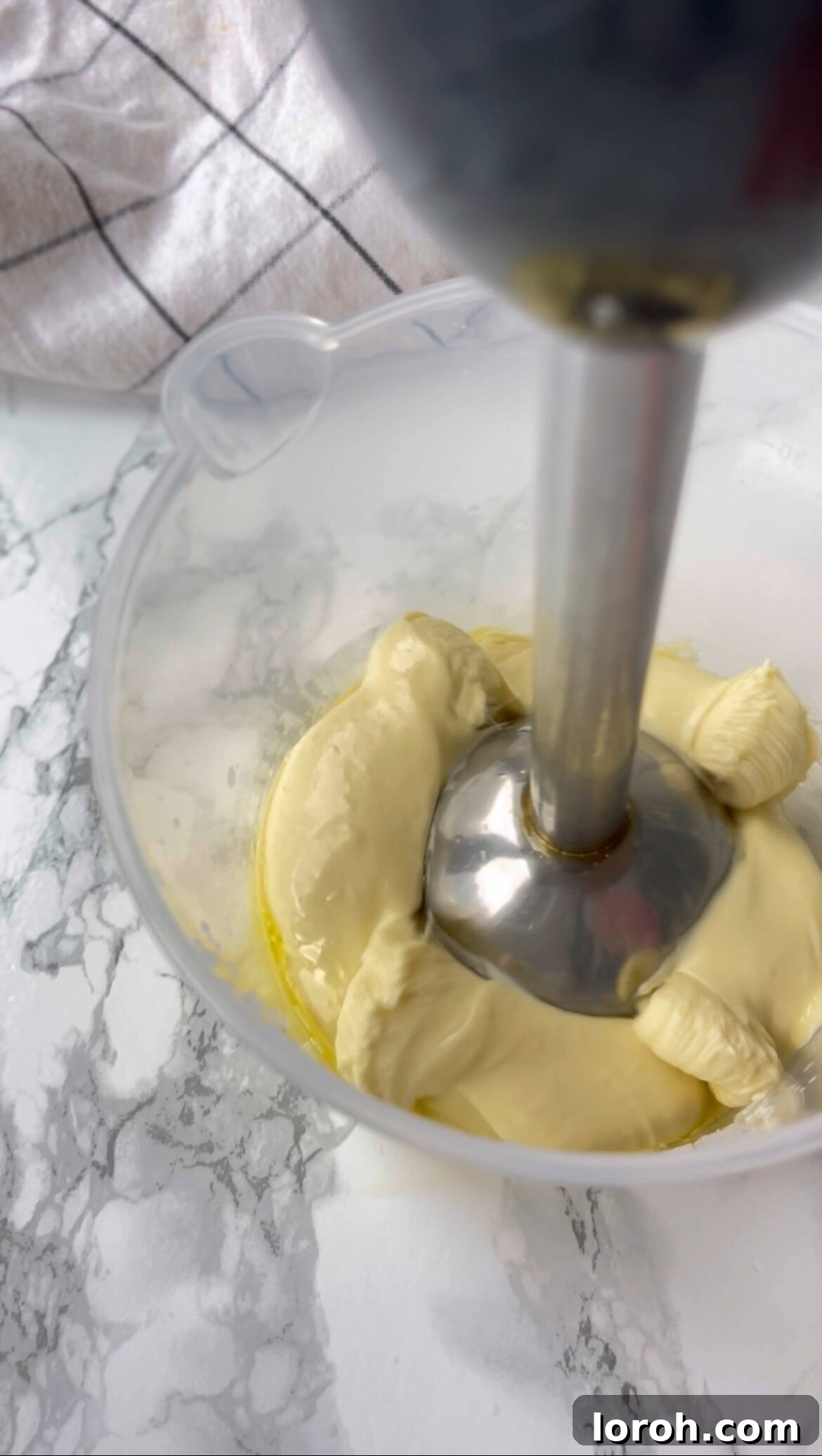blending to make roasted garlic aioli until thick and creamy