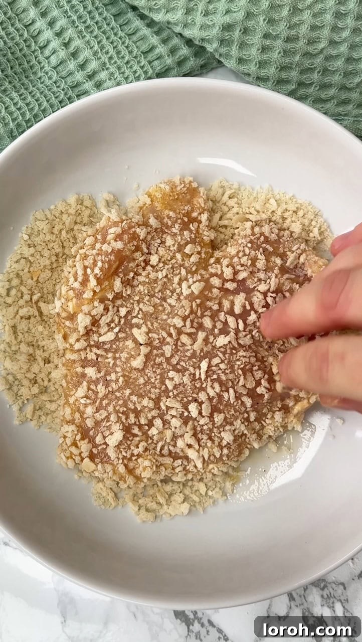 Crispy Chicken Parm Hero 9 Coating chicken breast in panko breadcrumbs