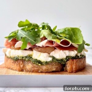 Pesto, Goat Cheese, and Parma Ham Toast with Rocket on Sourdough