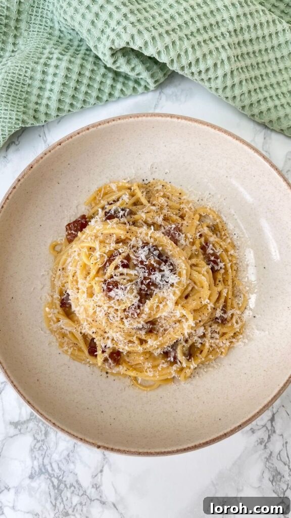 Carbonara, Elevated by Guanciale 2 carbonara with guanciale in a beige bowl