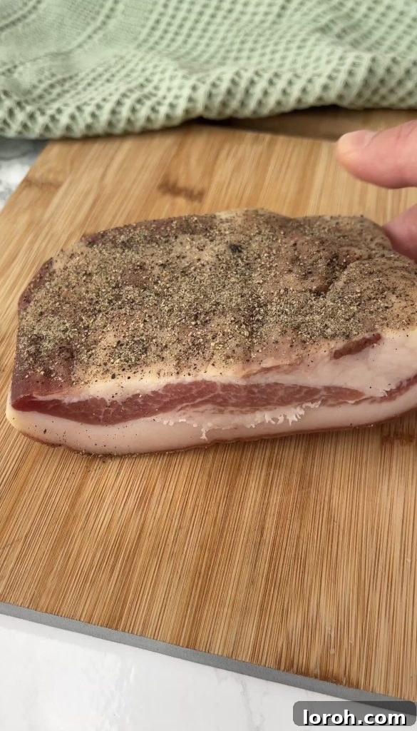 Carbonara, Elevated by Guanciale 3 guanciale on a wooden board