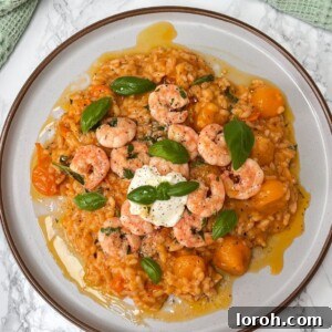 Creamy tomato mascarpone risotto with golden garlic prawns.