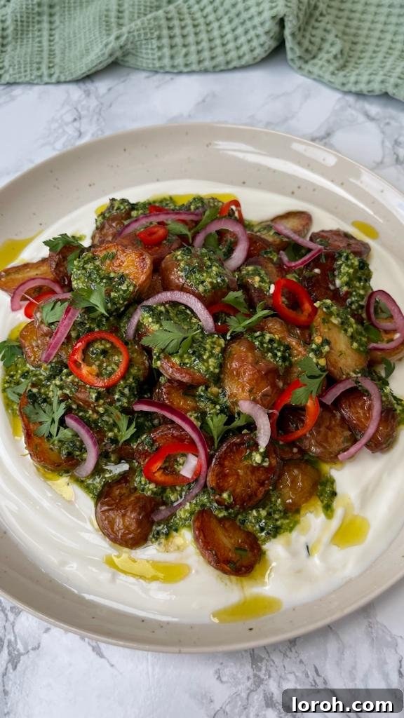 Rustic Herb Roasted Potatoes and Piquant Cavolo Nero Chimichurri 2 Crispy herb roasted potatoes with vibrant green chimichurri and creamy yogurt
