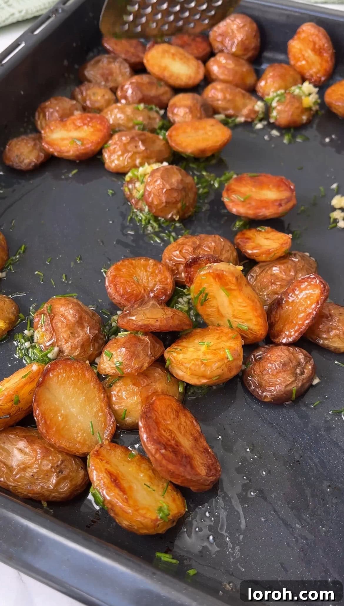Rustic Herb Roasted Potatoes and Piquant Cavolo Nero Chimichurri 5 Tossing herb roasted potatoes with garlic and chive oil