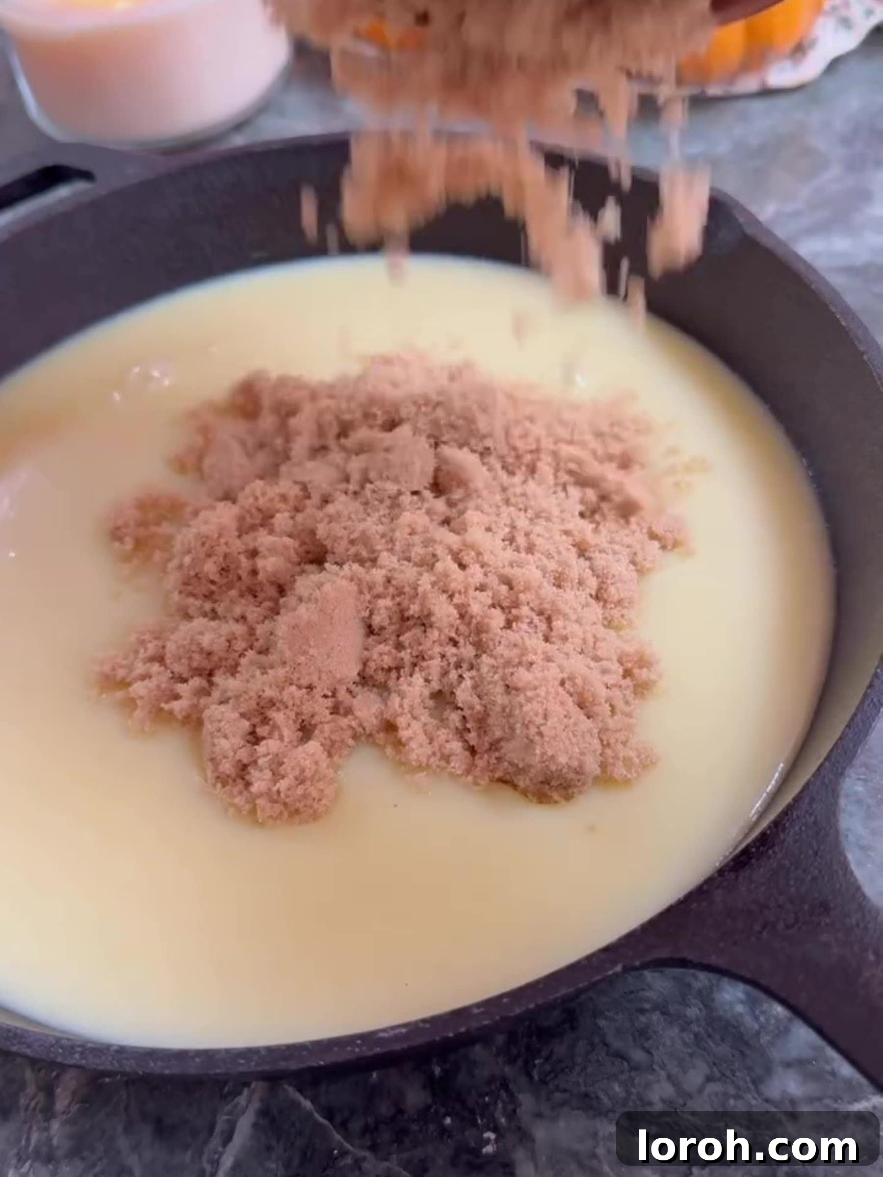 Effortless Condensed Milk Cookie Bars 6 Adding sugar to melted butter and condensed milk mixture
