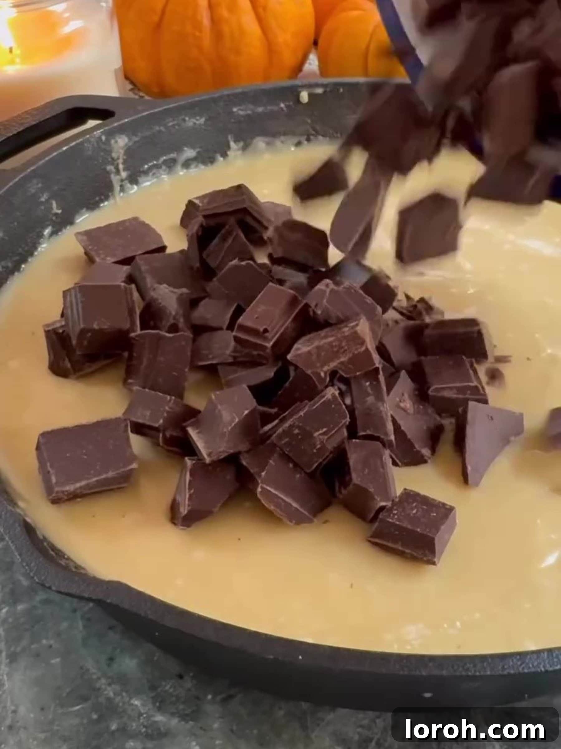 Effortless Condensed Milk Cookie Bars 8 Stirring chocolate chunks into the cookie dough