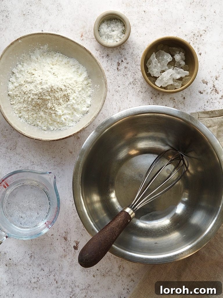 Golden Crispy Cod with Tartar Zing 5 Ingredients and equipment to make tempura batter on the countertop.