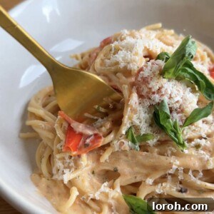 Boursin Tomato Pasta with creamy sauce and fresh basil.