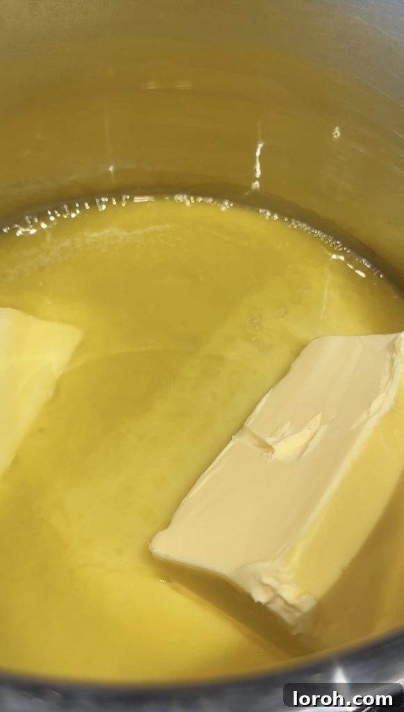 Step 1: Melting butter in a saucepan over medium-high heat.