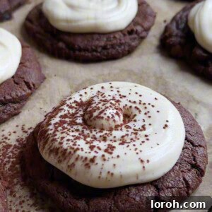 Delicious Tiramisu Cookies ready to be served, showcasing their rich chocolate base and creamy mascarpone topping with a cocoa dusting.