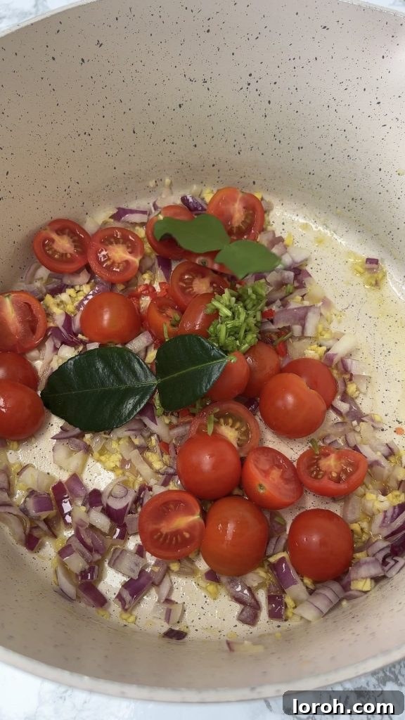 Frying aromatics for Thai Chicken Soup With Rice